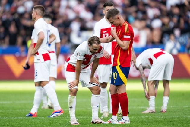 240615 Daniel Olmo of Spain consoles Lovro Majer of Croatia after the UEFA Euro 2024 Football Championship match between Spain and Croatia on June 15, 2024 in Berlin Photo Mathias Bergeld BILDBYRAN code MB MB0935 fotboll football soccer fotballs em europamästerskap em uefa euro uefa european football championship euro 2024 spanien spain kroatien croatia bbeng  Copyright: MATHIASxBERGELD BB240615MB116