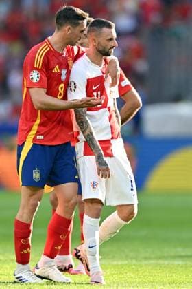 150624 KAI SCHWOERER Fabian Ruiz of Spain and Marcelo Brozovic of Croatia (L-R) react during the UEFA EURO, EM, Europameisterschaft,Fussball 2024 Group B match between Spain and Croatia at Olympiastadion on June 15, 2024 in Berlin, Germany. 150624-CPL-ESPvCRO-020