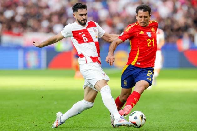 Spain v Croatia: Group B - UEFA EURO, EM, Europameisterschaft,Fussball 2024 BERLIN, GERMANY - JUNE 15: Josip Sutalo of Croatia is challenged by Mikel Oyarzabal of Spain during the UEFA EURO 2024 group stage match between Spain and Croatia at Olympiastadion on June 15, 2024 in Berlin, Germany. LukaxStanzl PIXSELL