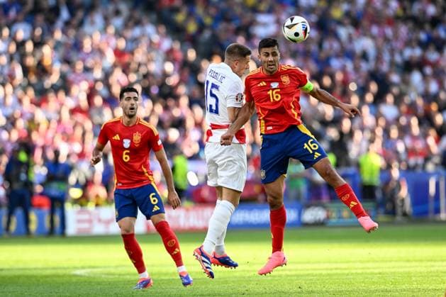 Spain v Croatia: Group B - UEFA EURO, EM, Europameisterschaft,Fussball 2024 BERLIN, GERMANY - JUNE 15: Mario Pasalic of Croatia competes for the ball with Rodri of Spain during the UEFA EURO 2024 group stage match between Spain and Croatia at Olympiastadion on June 15, 2024 in Berlin, Germany. MarkoxLukunic PIXSELL