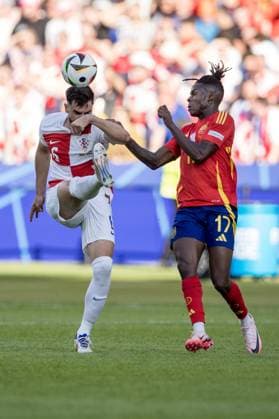 15th June 2024; Olympiastadion, Berlin, Germany; Euro 2024 Group B Football, Spain versus Croatia; Josip Sutalo (CRO) clears from Nico Williams (ESP)  ActionPlus12655023 TomaszxJastrzebowski