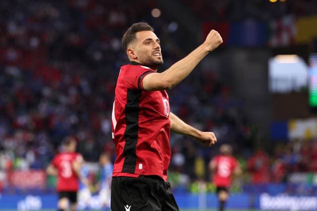 Dortmund, Germany, 15th June 2024. Nedim Bajrami of Albania celebrates after scoring to give the side a 1-0 lead during the UEFA European Championships match at BVB Stadion, Dortmund. Picture credit should read: Jonathan Moscrop Sportimage EDITORIAL USE ONLY. No use with unauthorised audio, video, data, fixture lists, club league logos or live services. Online in-match use limited to 120 images, no video emulation. No use in betting, games or single club league player publications. SPI-3182-0002