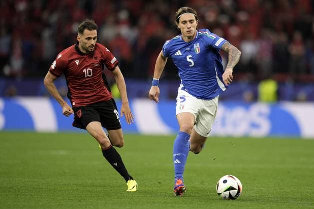 Italy s Riccardo Calafiori and Albania s Nedim Bajrami during the Euro 2024 soccer match between Italy and Albania at the Signal Iduna Park stadium in Dortmund, Germany - Saturday 15, June 2024. - Soccer.  Copyright: xFabioxFerrari LaPressex