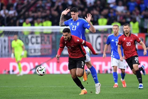 Soccer UEFA EURO 2024 Group Stage 1 Matchday Italy Albania on 15 06 2024 at BVB Stadion Dortmund in Dortmund Armando Broja Albania , front Alessandro Bastoni Italy , back xRx