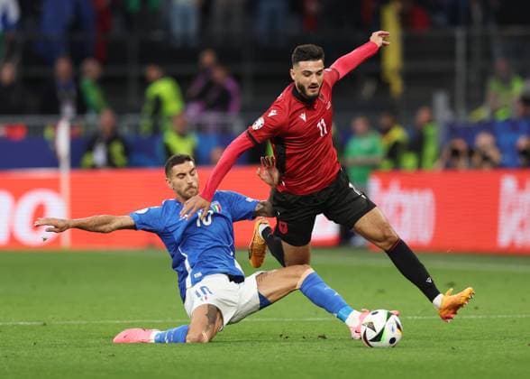 Dortmund, Germany, 15th June 2024. Lorenzo Pellegrini of Italy tackles Armando Broja of Albania during the UEFA European Championships match at Signal Idruna Park, Dortmund. Picture credit should read: David Klein Sportimage EDITORIAL USE ONLY. No use with unauthorised audio, video, data, fixture lists, club league logos or live services. Online in-match use limited to 120 images, no video emulation. No use in betting, games or single club league player publications. SPI-3195-0043