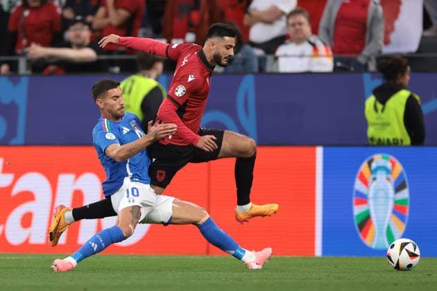 Dortmund, Germany, 15th June 2024. Lorenzo Pellegrini of Italy challenges Armando Broja of Albania during the UEFA European Championships match at BVB Stadion, Dortmund. Picture credit should read: Jonathan Moscrop Sportimage EDITORIAL USE ONLY. No use with unauthorised audio, video, data, fixture lists, club league logos or live services. Online in-match use limited to 120 images, no video emulation. No use in betting, games or single club league player publications. SPI-3182-0014
