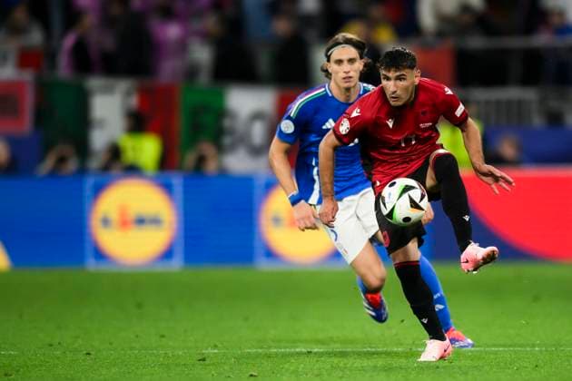 Italy v Albania - UEFA EURO, EM, Europameisterschaft,Fussball 2024 Qazim Laci of Albania competes for the bal with Riccardo Calafiori of Italy during UEFA EURO 2024 group stage football match between Italy and Albania. Dortmund Germany Copyright: xNicolòxCampox