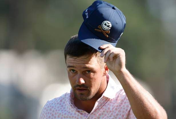 Bryson DeChambeau reacts after a putt for par on the ninth green during the third round of the 124th U.S. Open golf championship at Pinehurst Resort & Country Club in Pinehurst, N.C. on Saturday, June 15, 2024.  NCP20240615332 JOHNxANGELILLO