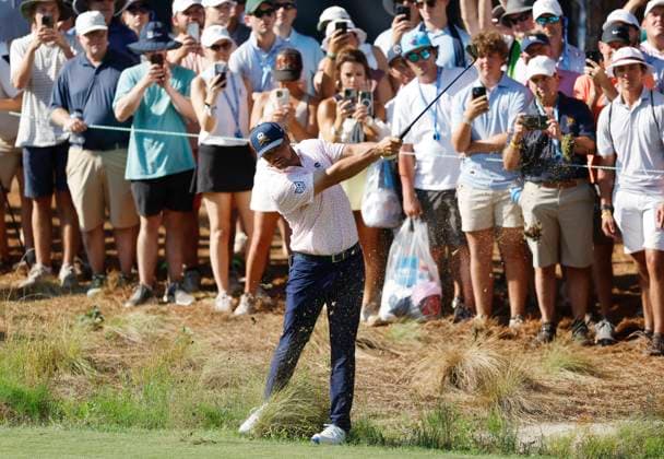 Bryson DeChambeau hits out of the rough on the eighth hole during the third round of the 124th U.S. Open golf championship at Pinehurst Resort & Country Club in Pinehurst, N.C. on Saturday, June 15, 2024.  NCP20240615336 JOHNxANGELILLO