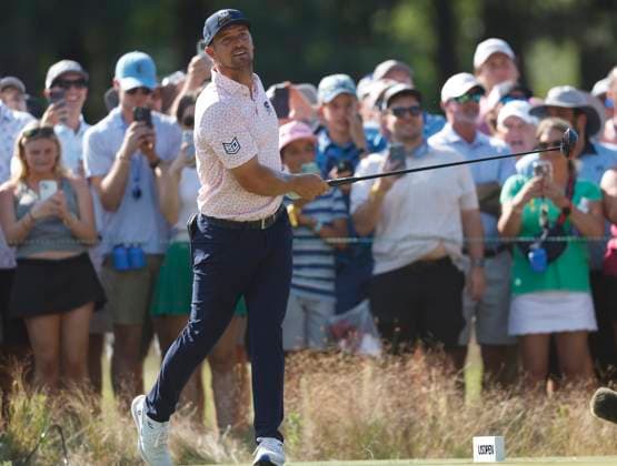 Bryson DeChambeau watches his tee shot on the eighth hole during the third round of the 124th U.S. Open golf championship at Pinehurst Resort & Country Club in Pinehurst, N.C. on Saturday, June 15, 2024.  NCP20240615341 JOHNxANGELILLO