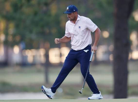 Bryson DeChambeau celebrates a birdie putt on the seventeenth green during the third round of the 124th U.S. Open golf championship at Pinehurst Resort & Country Club in Pinehurst, N.C. on Saturday, June 15, 2024.  NCP20240615369 JOHNxANGELILLO