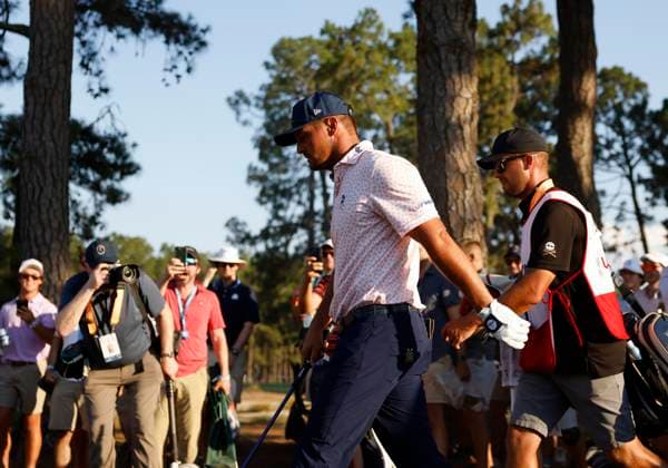 Bryson DeChambeau walks up the fourteenth fairway during the third round of the 124th U.S. Open golf championship at Pinehurst Resort & Country Club in Pinehurst, N.C. on Saturday, June 15, 2024. DeChambeau finished the day in the lead at 7-under-par.  NCP20240615375 JOHNxANGELILLO