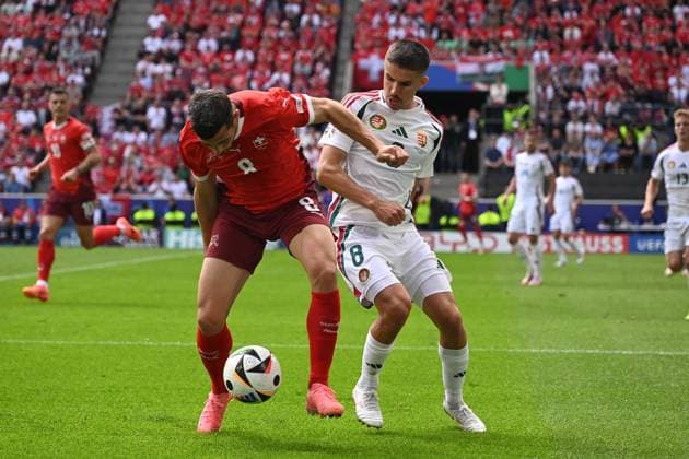 Remo Freuler (Switzerland)Adam Nagy (Hungary) during the UEFA EURO, EM, Europameisterschaft,Fussball Germany 2024 match between Hungary 1-3 Switzerland at Cologne Stadium on June 15, 2024 in Cologne, Germany. Noxthirdxpartyxsales  (256543114)