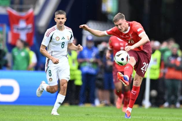 Michel Aebischer (Switzerland)Adam Nagy (Hungary) during the UEFA EURO, EM, Europameisterschaft,Fussball Germany 2024 match between Hungary 1-3 Switzerland at Cologne Stadium on June 15, 2024 in Cologne, Germany. Noxthirdxpartyxsales  (256543299)