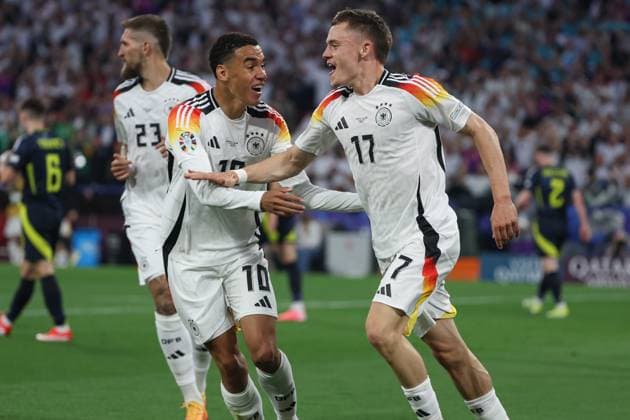 Euro 2024 Germany Scotland on 14 06 2024 at the Allianz Arena in Munich Cheering, goal celebration, goal scorer, goal scorer Florian Wirtz Germany 17 cheers after his goal for 1 to 0 with Jamal Musiala Germany 10 MH