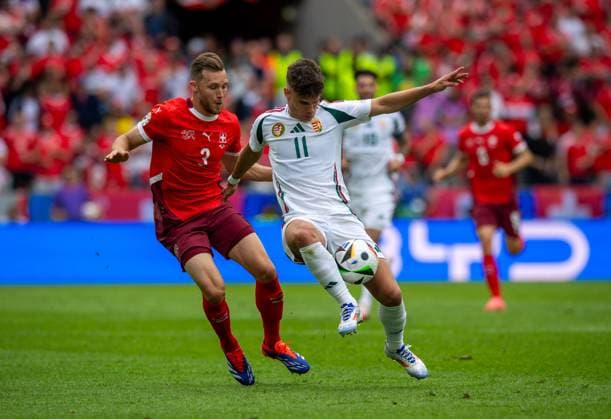 Football, Men, Season 2023 24, Euro 2024 Group A 1 Matchday in Cologne, Hungary Switzerland, f l Silvan Widmer Switzerland , Milos Kerkez Hungary , 15 06 2024, Copyright: xSebastianxRäppold MatthiasxKochx