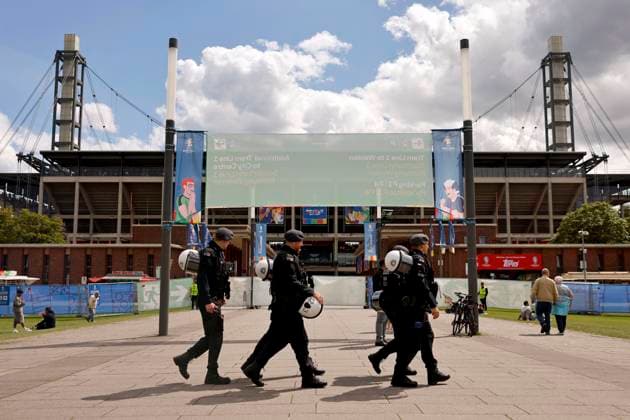 The Cologne Rhein Energie Stadium is guarded by police officers of the NRW police during the preliminary round match Hungary Switzerland 1 3 at the European Football Championship 2024 During the UEFA EURO 2024 European Football Championship, the Cologne stadium is one of the venues and is decorated with UEFA flags showing the logo of the European Football Championship Theme picture, symbolic picture Cologne, 15 06 2024 NRW Germany Copyright: xChristophxHardtx