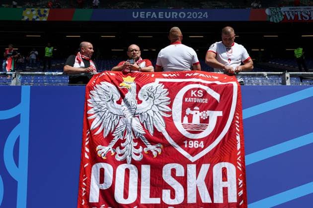 Poland fans enjoy the pre-match atmosphere Poland v Netherlands, UEFA European Championship, EM, Europameisterschaft 2024, Group D, Football, Volksparkstadion, Hamburg, Germany, 16 Jun 2024 EDITORIAL USE ONLY No use with unauthorised audio, video, data, fixture lists, club league logos or live services. Online in-match use limited to 120 images, no video emulation. No use in betting, games or single club league player publications. Copyright: xMattxWest Shutterstockx 14539367g