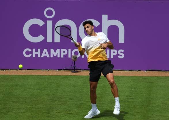 16th June 2024; Cinch Championships, Queens Club, West Kensington, London, England: Cinch Championships Queens Club, Qualifying Day 2; Francisco Cerundolo (ARG) with a forehand shot to Carlos Alcaraz (ESP) during his practice session on Centre Court  ActionPlus12655113 JohnxPatrickxFletcher