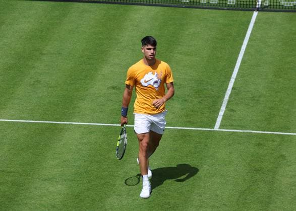 16th June 2024; Cinch Championships, Queens Club, West Kensington, London, England: Cinch Championships Queens Club, Qualifying Day 2; Defending Cinch Champion Carlos Alcaraz (ESP) on Centre Court during his practise session with Francisco Cerundolo (ARG)  ActionPlus12655093 JohnxPatrickxFletcher