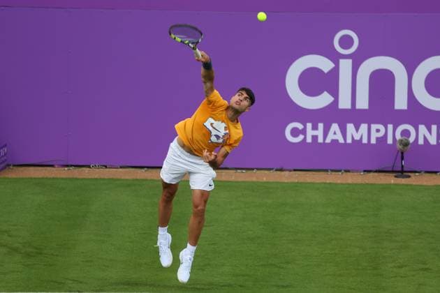 16th June 2024; Cinch Championships, Queens Club, West Kensington, London, England: Cinch Championships Queens Club, Qualifying Day 2; Defending Cinch Champion Carlos Alcaraz (ESP) serves to Francisco Cerundolo (ARG) during his practice session on Centre Court  ActionPlus12655106 JohnxPatrickxFletcher