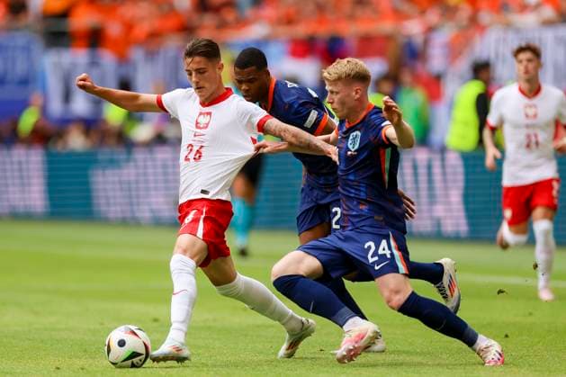 Kacper Urbanski Poland , Denzel Dumfries Netherlands and Jerdy Schouten Netherlands fight for the ball, UEFA EURO 2024 Group D, Poland vs Netherlands, Volksparkstadion Hamburg, 16 06 2024, Hamburg, Germany
