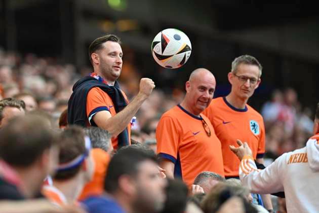 GER, Euro 2024, Group D, Poland POL vs Netherlands NED 16 06 2024, Volksparkstadion, GER, Euro 2024, Group D, Poland POL vs Netherlands NED in the picture Feature Dutch fan fists the ball back again nordphotoxGmbH xWitke nph00002
