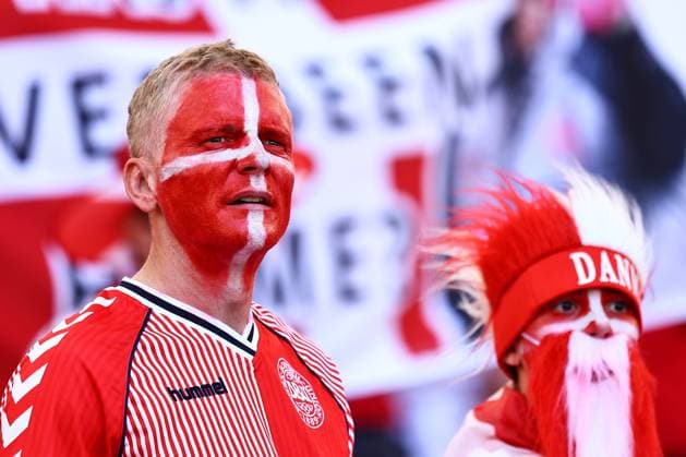 A Denmark fan with face paint in the stadium ahead of the game Slovenia v Denmark, UEFA European Championship, EM, Europameisterschaft 2024, Group C, Football, Stuttgart Arena, Stuttgart, Germany, 16 Jun 2024 EDITORIAL USE ONLY No use with unauthorised audio, video, data, fixture lists, club league logos or live services. Online in-match use limited to 120 images, no video emulation. No use in betting, games or single club league player publications.  Copyright: xMichaelxZemanek Shutterstockx 14539399i
