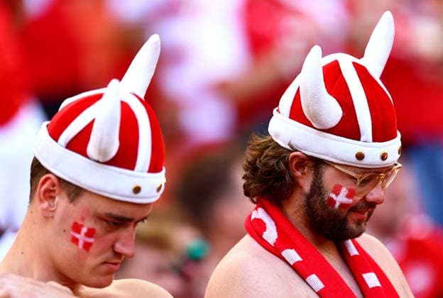 Fans of Denmark wearing spiked hats and face paint in the stadium ahead of the game Slovenia v Denmark, UEFA European Championship, EM, Europameisterschaft 2024, Group C, Football, Stuttgart Arena, Stuttgart, Germany, 16 Jun 2024 EDITORIAL USE ONLY No use with unauthorised audio, video, data, fixture lists, club league logos or live services. Online in-match use limited to 120 images, no video emulation. No use in betting, games or single club league player publications. Copyright: xMichaelxZemanek Shutterstockx 14539399h