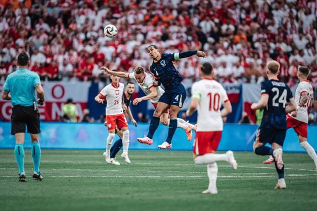 Soccer Men UEFA European Football Championship 2024 Group D Poland vs Netherlands 16 06 2024 Header duel between Adam Buksa 16, Poland left and Virgil van Dijk 4, Netherlands right Hamburg Volksparkstadion Hamburg Germany