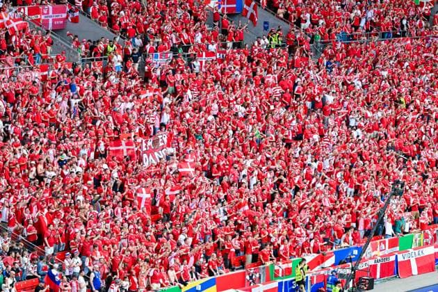 Fans of Denmark cheer for their team during the UEFA EURO 2024 Group C match between Slovenia and Denmark, Arena Stuttgart on June 16, 2024 in Stuttgart, Germany Photo by Fans of Denmark cheer for their team during the UEFA EURO 2024 Group C match between Slovenia and Denmark at Arena Stuttgart on June 16, 2024 in Stuttgart, Germany Photo by Defodi 0581864239st Defodi-