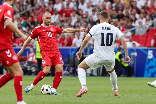 in duel, action, with Christian Eriksen 10 Denmark , Max Timi Elsnik 10 Slovenia , Slovenia vs Denmark, Soccer, UEFA Euro 2024, Group stage, Matchday 1, 16 06 2024 Stuttgart Baden Wuerttemberg Germany Copyright: xkolbert-press ChristianxKolbertx