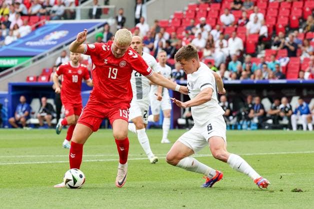 in duel, action, with Jonas Wind 19 Denmark , Jaka Bijol 6 Slovenia , Slovenia vs Denmark, Soccer, UEFA Euro 2024, Group stage, Matchday 1, 16 06 2024 Stuttgart Baden Wuerttemberg Germany Copyright: xkolbert-press ChristianxKolbertx
