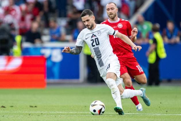 240616 Petar Stojanovic of Slovenia and Christian Eriksen of Denmark during the UEFA Euro 2024 Football Championship match between Slovenia and Denmark on June 16, 2024 in Stuttgart Photo Mathias Bergeld BILDBYRAN code MB MB0936 fotboll football soccer fotballs em europamästerskap em uefa euro uefa european football championship euro 2024 slovenien slovenia danmark denmark bbeng  Copyright: MATHIASxBERGELD BB240616MB052