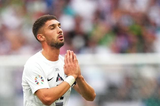 Slovenia s Adam Gnezda Cerin during the Euro 2024 soccer match between Slovenia and Denmark at the Stuttgart Arena , Stuttgart , Germany - Sunday 16 , June , 2024. - Soccer .  Copyright: xSpada LaPressex