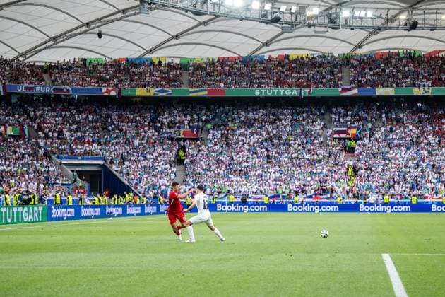 240616 Alexander Bah of Denmark and Erik Janza of Slovenia during the UEFA Euro 2024 Football Championship match between Slovenia and Denmark on June 16, 2024 in Stuttgart Photo Mathias Bergeld BILDBYRAN code MB MB0936 fotboll football soccer fotballs em europamästerskap em uefa euro uefa european football championship euro 2024 slovenien slovenia danmark denmark bbeng  Copyright: MATHIASxBERGELD BB240616MB063