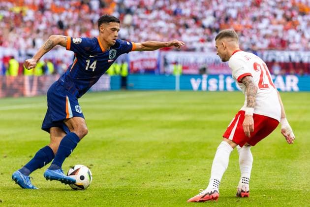 Poland v Netherlands - UEFA EURO, EM, Europameisterschaft,Fussball 2024 Tijjani Reijnders, Sebastian Szymanski are playing during the UEFA Euro 2024 Group D match between Poland v Netherlands, at the stadium in Hamburg, Germany, on June 16, 2024. Hamburg Germany  Copyright: xAndrzejxIwanczukx originalFilename:iwanczuk-polandvn240616_npHND.jpg