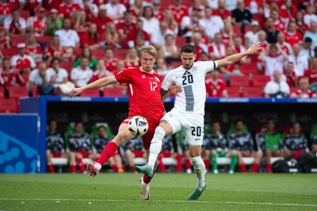 Victor Bernth Flesner Kristiansen Denmark, 17 in duel with Petar Stojanovic Slovenia, 20 , GER, Slovenia SVN vs Denmark DEN , European Football Championship, UEFA EURO 2024, Group C, Matchday 1, 16 06 2024 GER, Slovenia SVN vs Denmark DEN , European Football Championship, UEFA EURO 2024, Group C, Matchday 1, 16 06 2024 Stuttgart Copyright: xEibner-Pressefoto Memmlerx EP_MMR