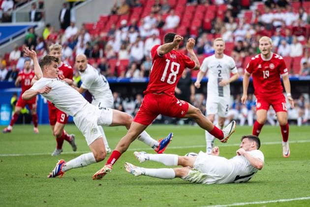 240616 Jaka Bijol and Erik Janza of Slovenia against Alexander Bah of Denmark during the UEFA Euro 2024 Football Championship match between Slovenia and Denmark on June 16, 2024 in Stuttgart Photo Mathias Bergeld BILDBYRAN kod MB MB0936 fotboll football soccer fotballs em europamästerskap em uefa euro uefa european football championship euro 2024 slovenien slovenia danmark denmark bbeng  Copyright: MATHIASxBERGELD BB240616MB069