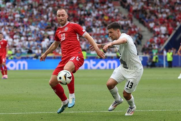 in duel, action, with Christian Eriksen 10 Denmark , Erik Janza 13 Slovenia , Slovenia vs Denmark, Football, UEFA Euro 2024, Group stage, Matchday 1, 16 06 2024 Stuttgart Baden Wuerttemberg Germany Copyright: xkolbert-press ChristianxKolbertx