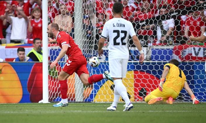 Soccer Euro 2024 opening match Group C 16 06 2024 Slovenia Denmark Goal for 0 1 by goal scorer Christian Eriksen left, Denmark against goalkeeper Jan Oblak rte, Slovenia
