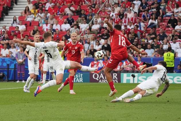 Jaka Bijol Slovenia, Slovenia, 06 clears against Alexander Bah Denmark, Denmark, 18 Stuttgart 16 06 2024 Denmark vs Slovenia, EURO2024 M6, Group C, EM Arena Stuttgart