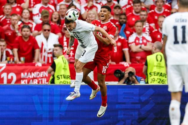 16 06 2024, Football, European Championship, Slovenia Denmark, GER, Stuttgart, Football Arena, picture from left David Brekalo Slovenia, 23 , Alexander Bah Denmark, 18 , Action, duels, fighting for the ball, Copyright: HMBxMedia xHeikoxBecker