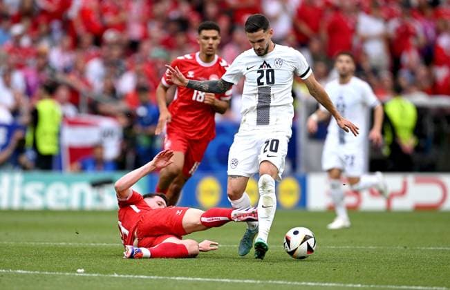 Football Euro 2024 Group C opening match 16 06 2024 Slovenia Denmark Pierre Emile Hoejbjerg left, Denmark v Petar Stojanovic right, Slovenia
