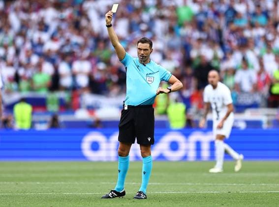 Referee, Sandro Schärer shows a yellow card Slovenia v Denmark, UEFA European Championship, EM, Europameisterschaft 2024, Group C, Football, Stuttgart Arena, Stuttgart, Germany, 16 Jun 2024 EDITORIAL USE ONLY No use with unauthorised audio, video, data, fixture lists, club league logos or live services. Online in-match use limited to 120 images, no video emulation. No use in betting, games or single club league player publications. Copyright: xMichaelxZemanek Shutterstockx 14539399dd