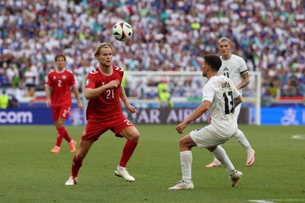 in duel, action, with Morten Hjulmand 21 Denmark , Erik Janza 13 Slovenia , Slovenia vs Denmark, Soccer, UEFA Euro 2024, Group stage, Matchday 1, 16 06 2024 Stuttgart Baden Wuerttemberg Germany Copyright: xkolbert-press ChristianxKolbertx