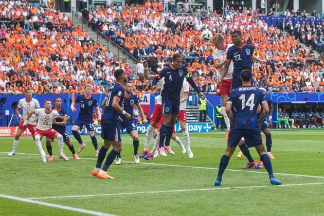 16th June 2024; Volksparkstadion, Hamburg, Germany; Euro 2024 Group D Football, Poland versus Netherlands; Adam Buksa (POL) scores the opening goal with a header in the 16th minute  ActionPlus12655312 TomaszxJastrzebowski