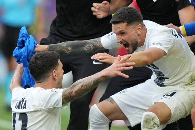 Slovenia s Erik Janza celebrates after scoring 1-1 during the Euro 2024 soccer match between Slovenia and Denmark at the Stuttgart Arena , Stuttgart , Germany - Sunday 16 , June , 2024. - Soccer .  Copyright: xSpada LaPressex