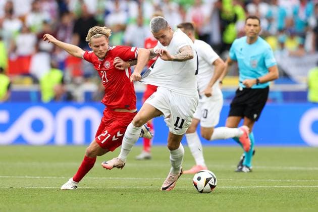 Soccer UEFA EURO 2024 Group Stage 1 Matchday Slovenia Denmark on 16 06 2024 at Stuttgart Arena in Stuttgart Morten Hjulmand Denmark , left Benjamin Sesko Slovenia , right xMSx