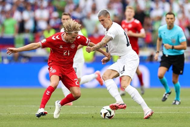 Soccer UEFA EURO 2024 Group Stage 1 Matchday Slovenia Denmark on 16 06 2024 at Stuttgart Arena in Stuttgart Morten Hjulmand Denmark , left Benjamin Sesko Slovenia , right xMSx